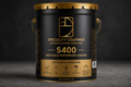 Black and gold canister of Specialty Coatings S400 on a dark background